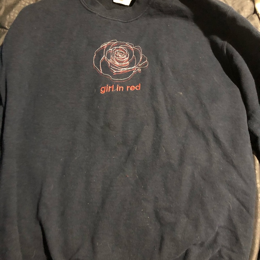 girl in red sweatshirt